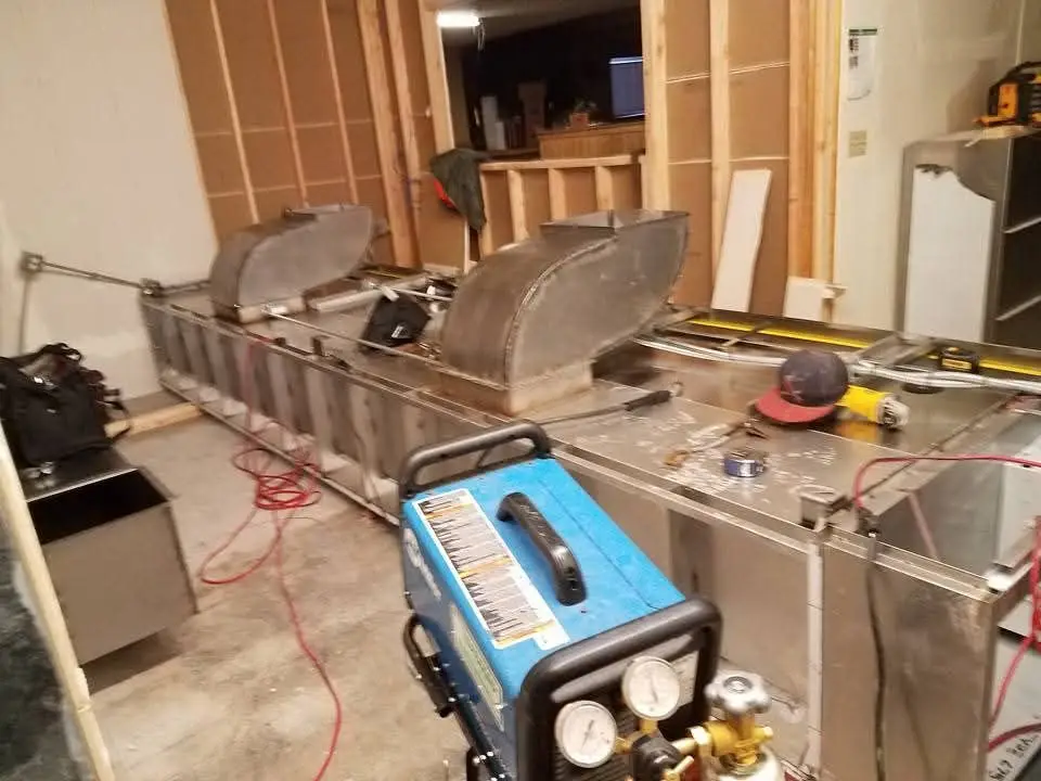 Sheet metal fabrication bench inside the MetalHead shop