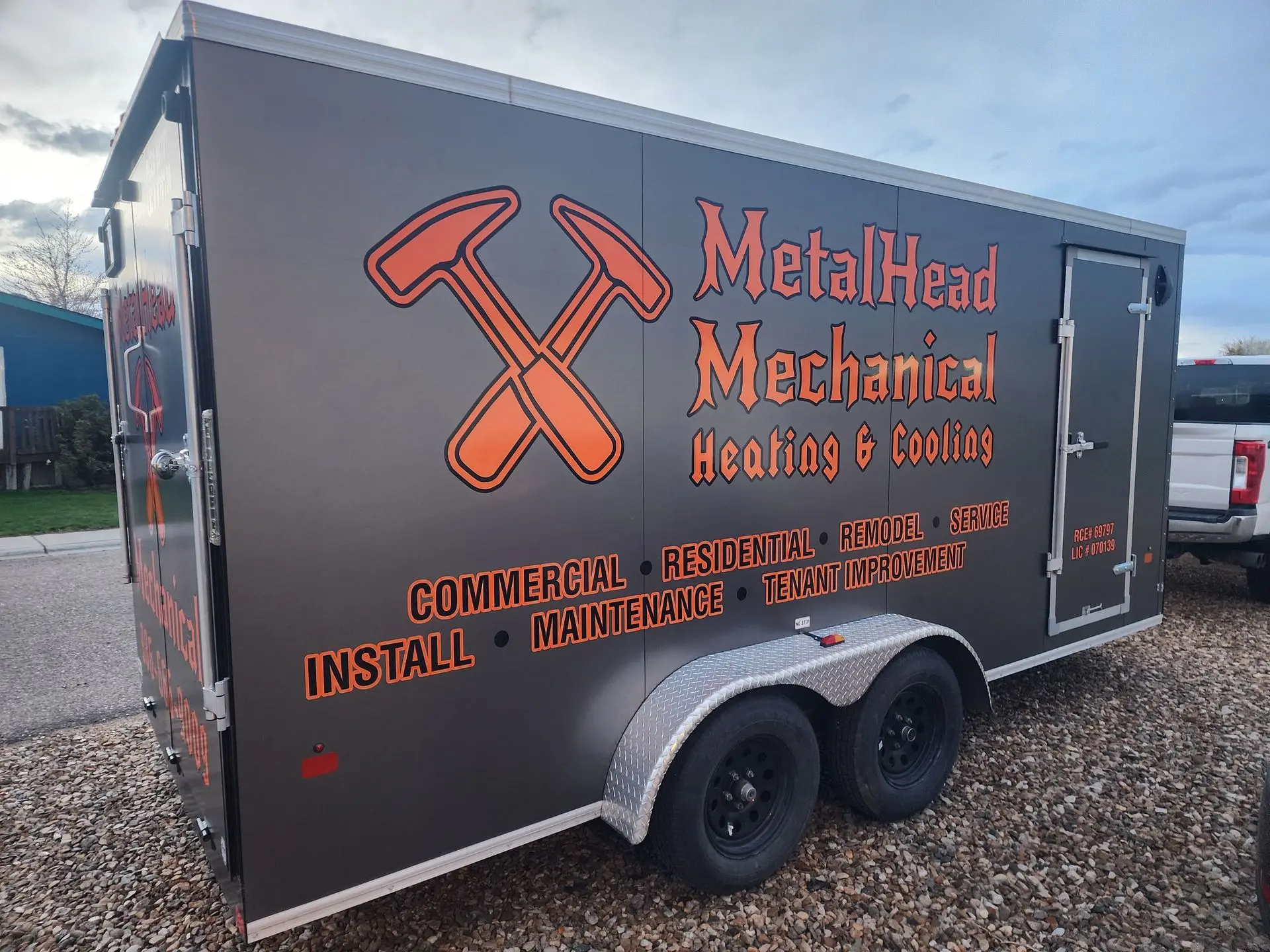 MetalHead Mechanical branded trailer, side view