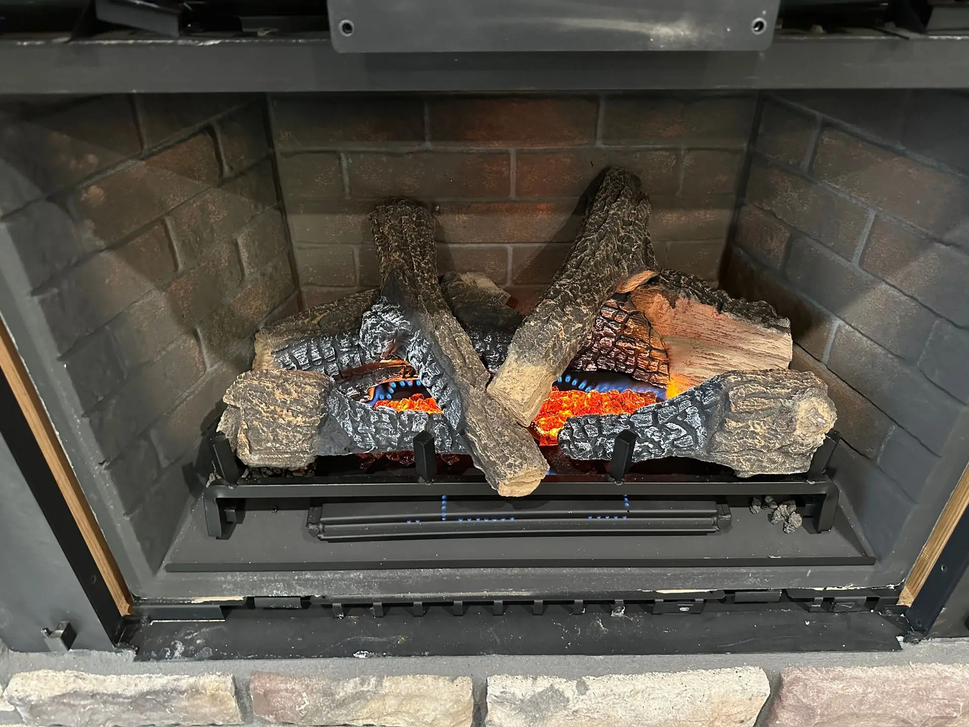 Gas fireplace insert burning after service