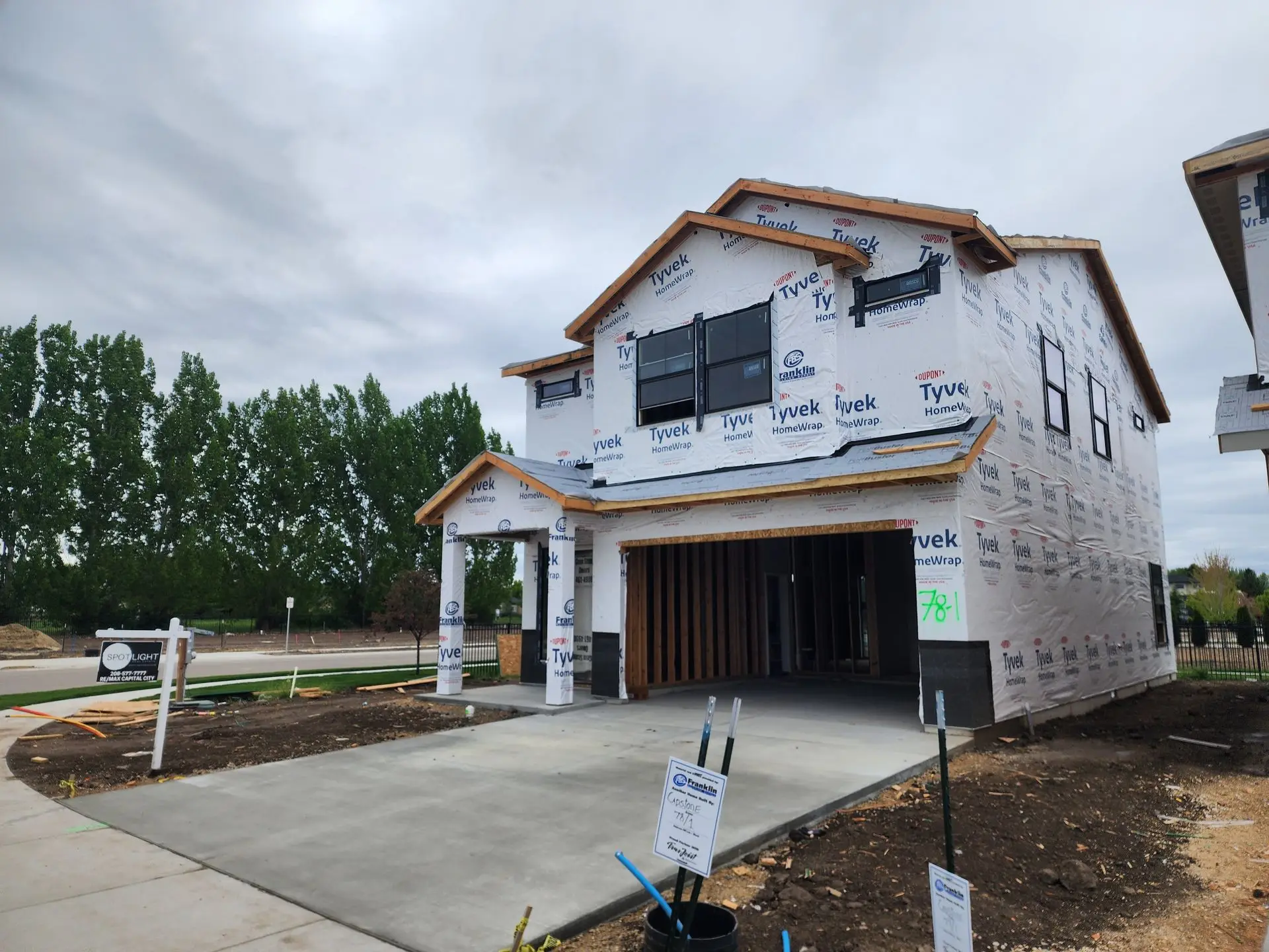 Two-story house at the rough-in stage of construction